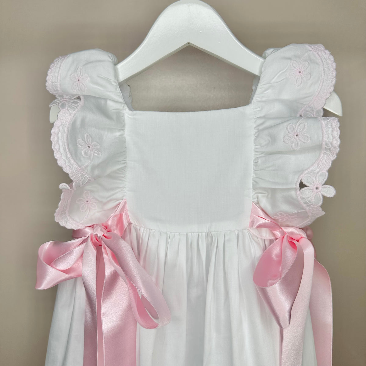 White Dress With Pink Ribbon