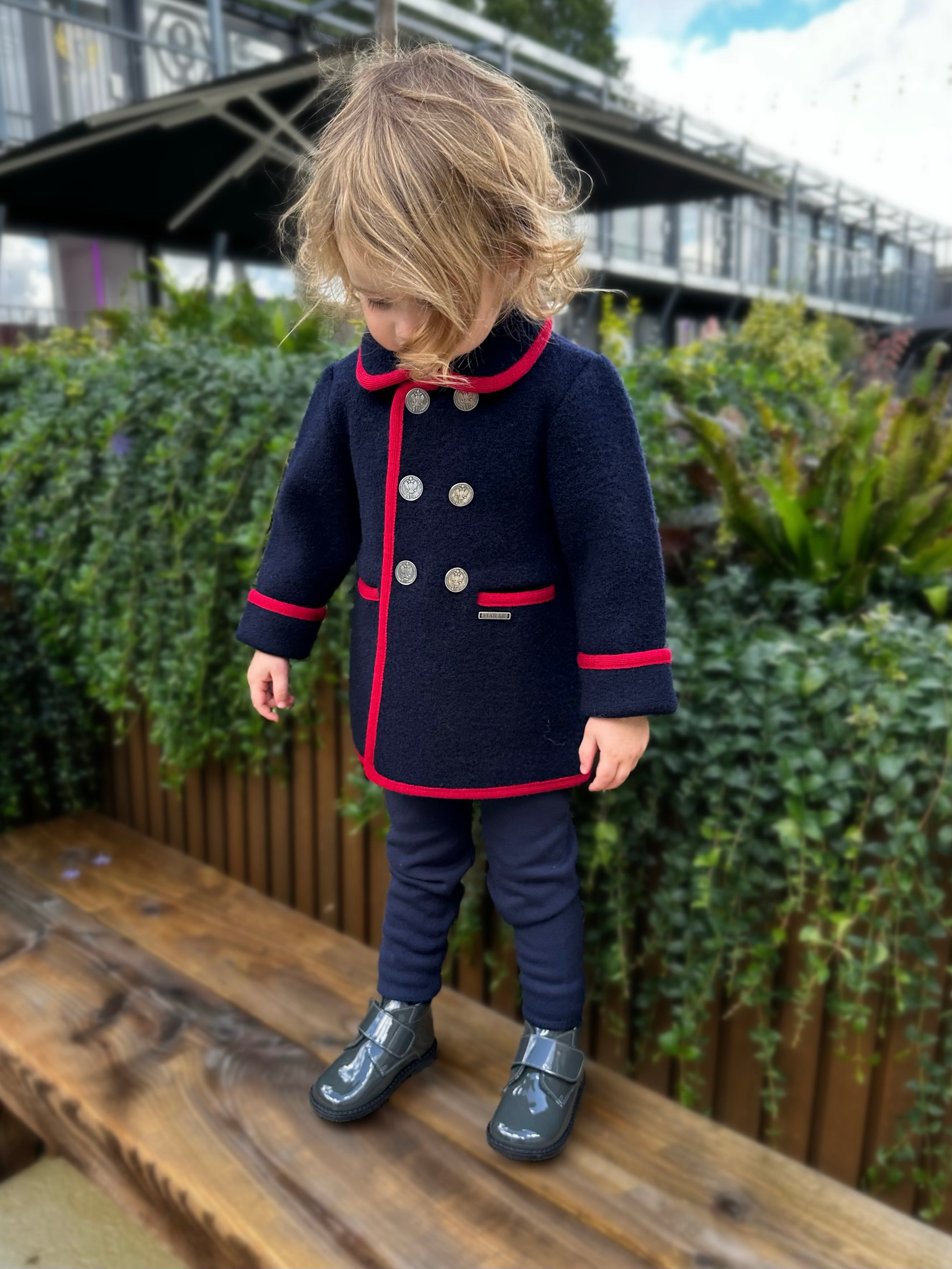 Navy coat with red trim sales