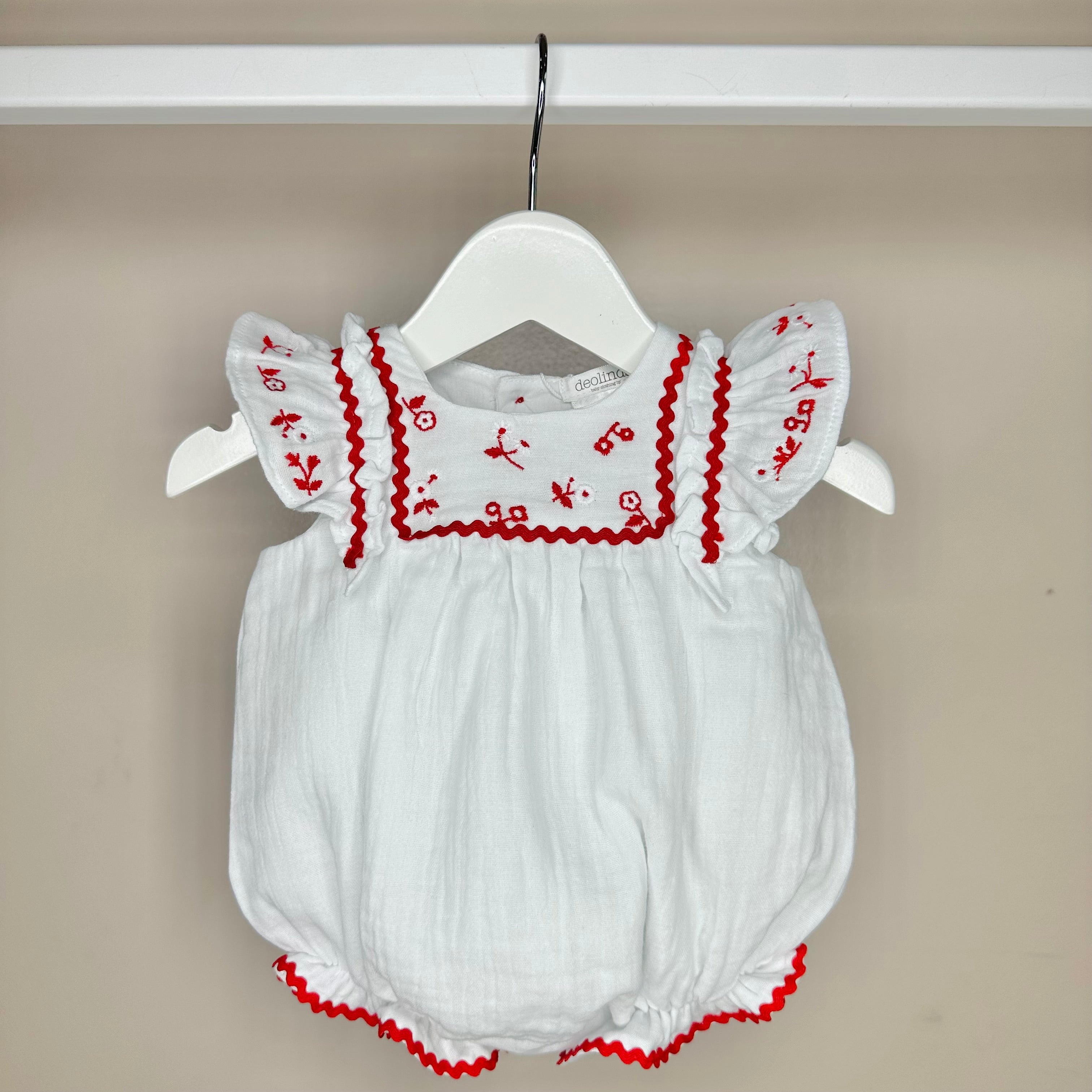 White Cheesecloth Romper With Red Detailing